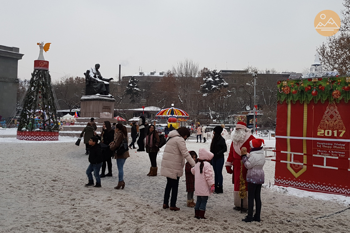 Armenian Santa Claus greeting people on the streets of Yerevan